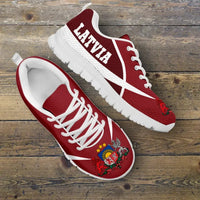 Red Latvia sneakers with white stripes and laces, crest graphic and white sole