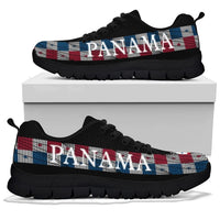 Panama United sneakers on box, black upper with plaid PANAMA band across side, black sole