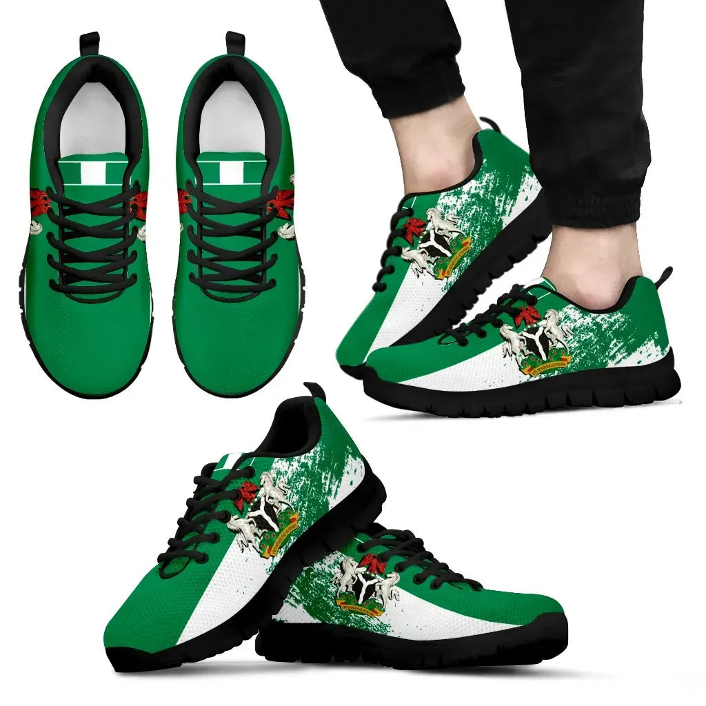 Green Nigeria-themed sneakers with white stripe, black laces, black sole and side print