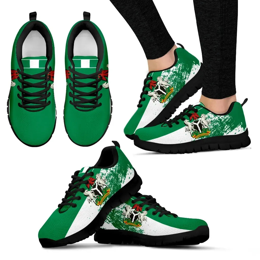 Green Nigeria-themed low-top sneakers with white stripe, black laces, black sole
