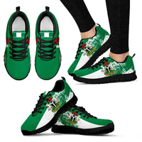 Green Nigeria-themed low-top sneakers with white stripe, black laces, black sole