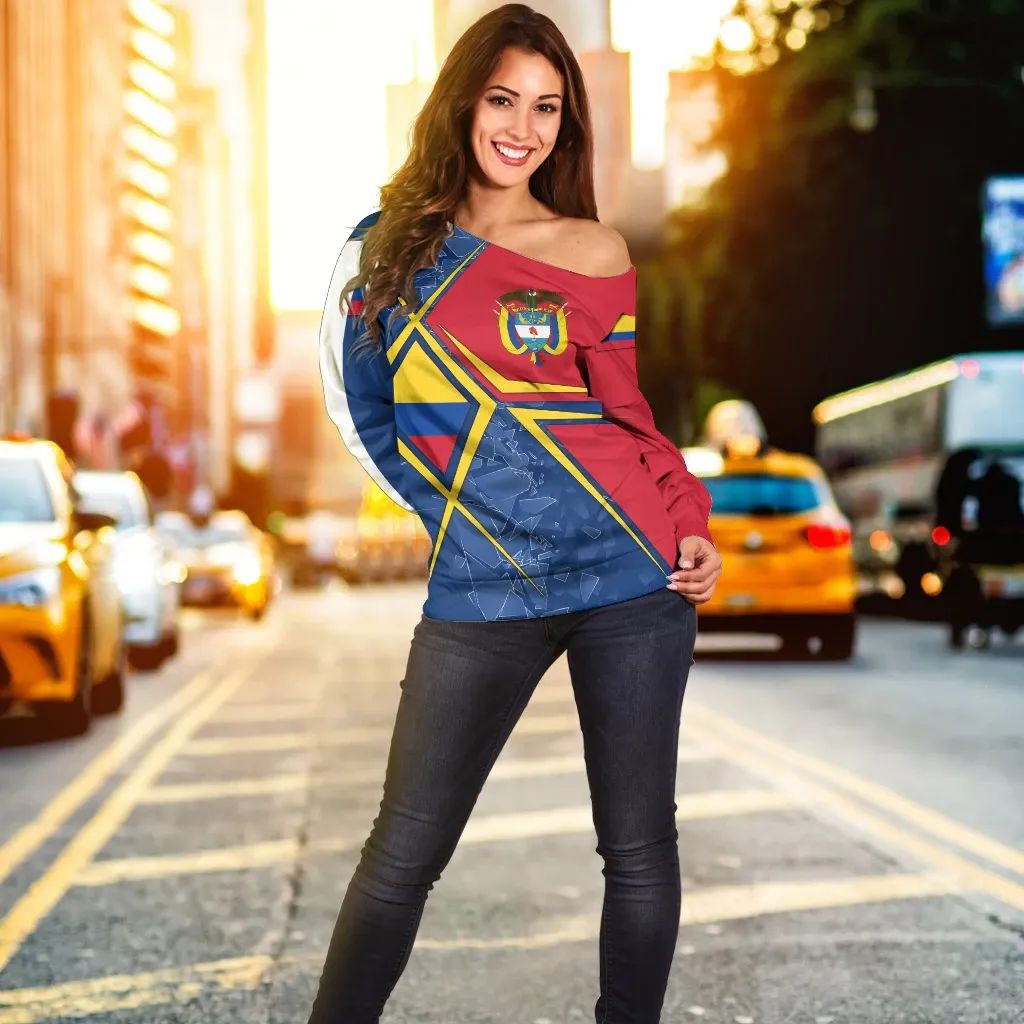 Off-shoulder sweater in red, blue, yellow; Colombia crest print