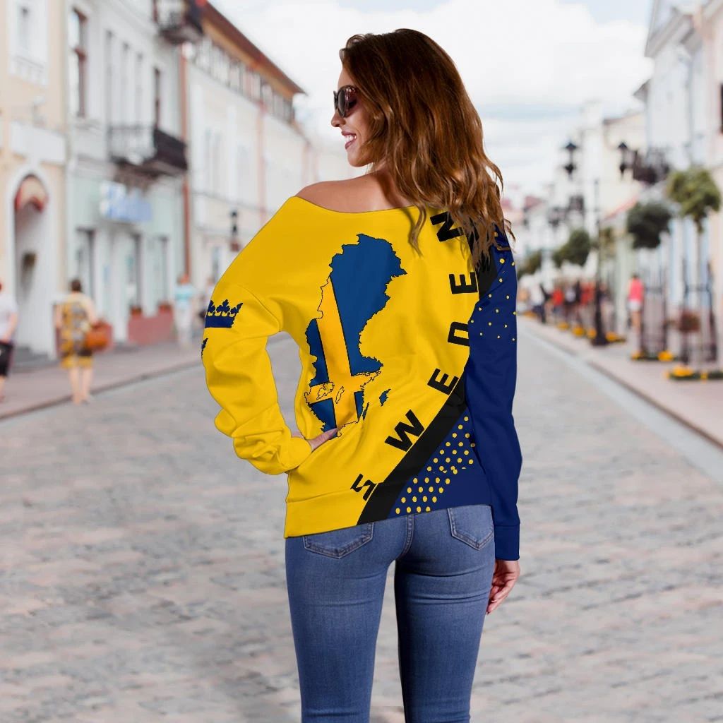 Yellow off-shoulder sweater, back view, with blue Sweden map and black letter stripe
