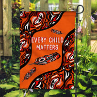 Orange flag, black/red pattern with “EVERY CHILD MATTERS” and feather graphics