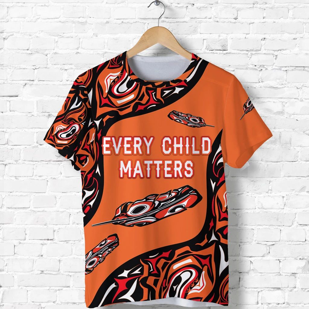 Orange T-shirt with black feather pattern and “Every Child Matters” front text