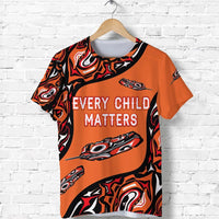 Orange T-shirt with black feather pattern and “Every Child Matters” front text