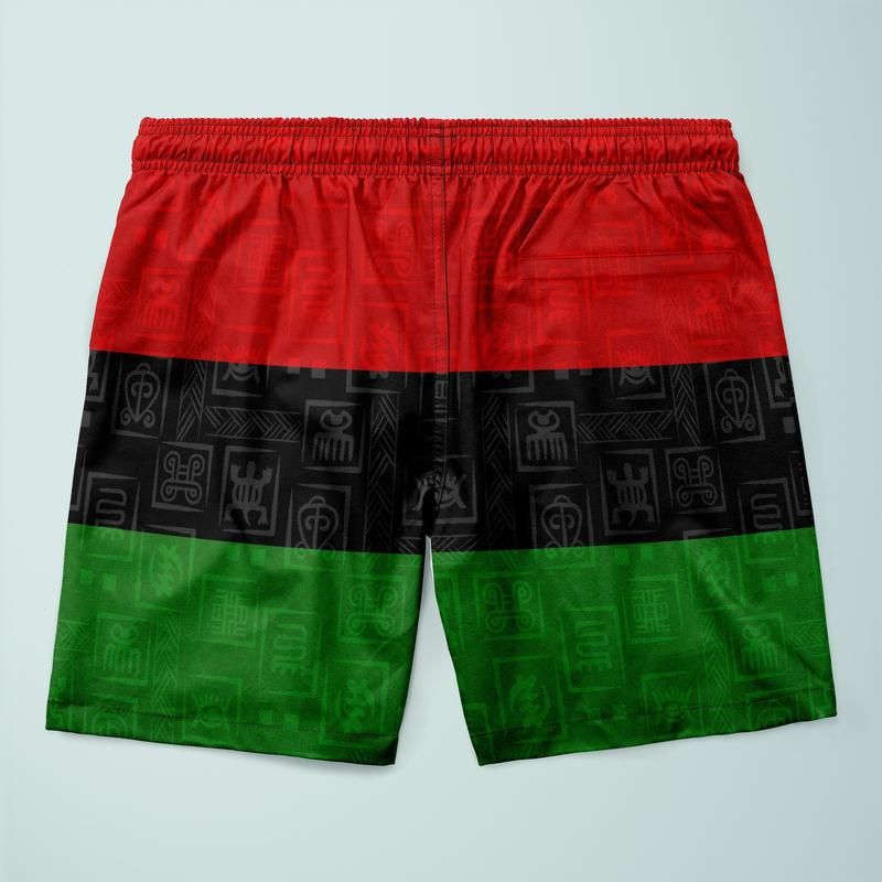Swim shorts with drawstring closure and red, black, and green color-block pattern