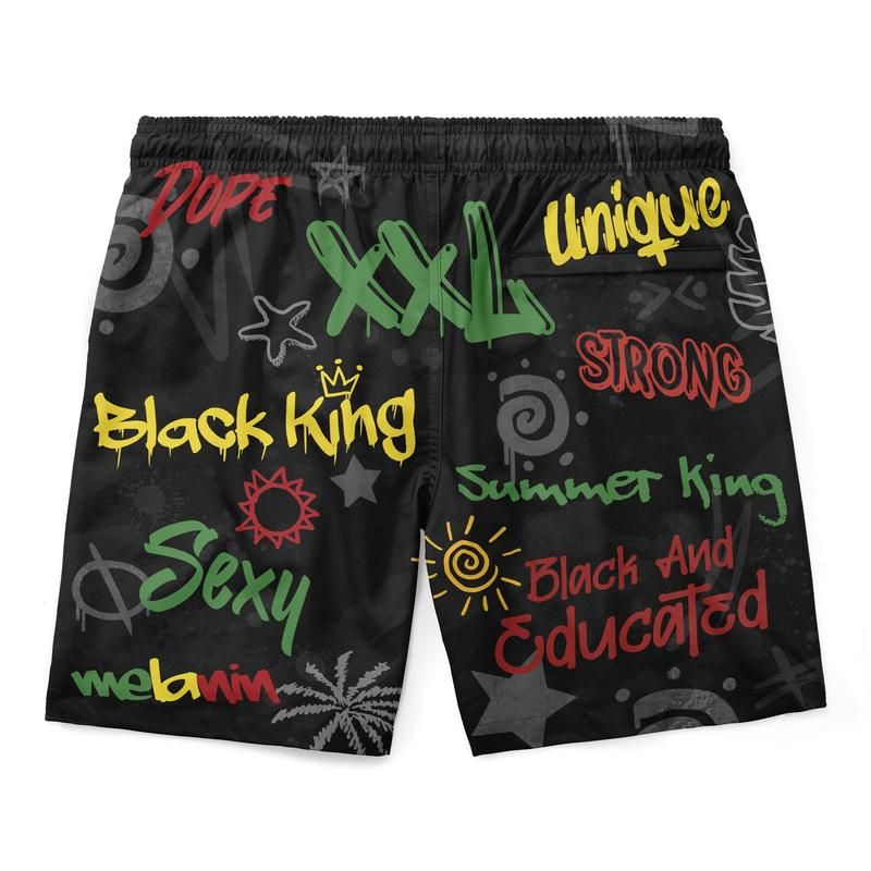 Shorts negros con estampado “Strong” y “Unique”; frente completo multicolor, cintura elástica
