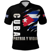 Black polo shirt with grunge Cuba flag graphic and “PATRIA Y VIDA” text