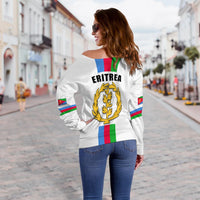 Off-shoulder white sweatshirt, Eritrea emblem on back, multicolor stripe flag panels