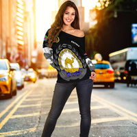 Black off-shoulder women’s top with Eritrea crest on front; long sleeves with flag accents