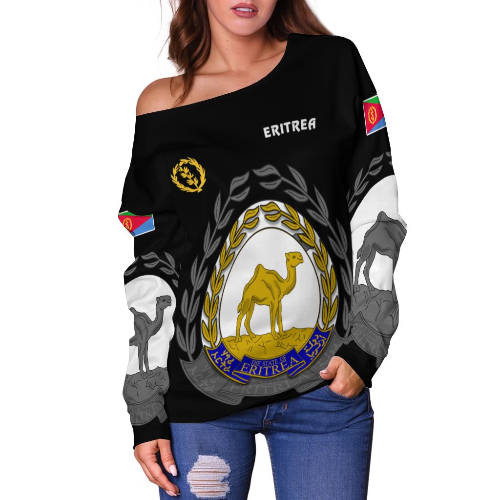 Black off-shoulder women’s sweater close-up with Eritrea crest and graphic animal figures
