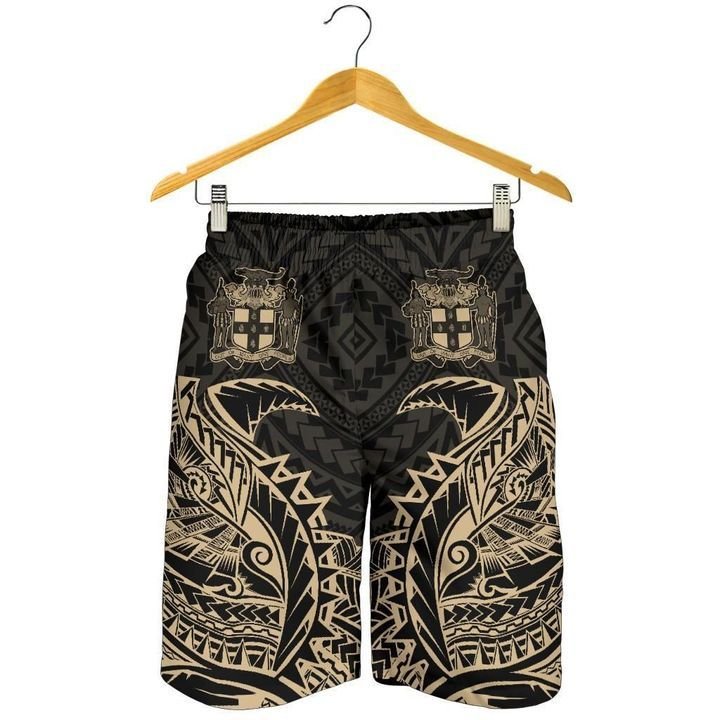 Black men’s shorts hanging on wooden hanger, beige tribal print, elastic waist