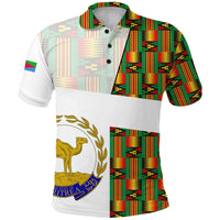 White polo shirt with Eritrea-themed crest, Kente pattern side panel, button collar