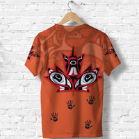 Orange T-shirt back with small black paw-print icons