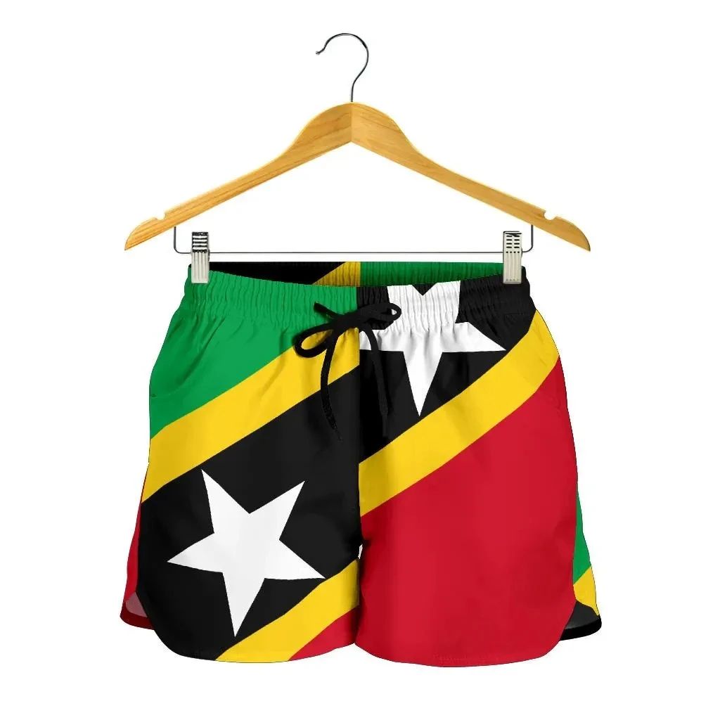 Green drawstring swim shorts with Saint Kitts and Nevis flag print, black star pattern