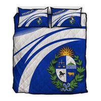 Blue quilt bed set with Uruguay emblem and two matching pillow shams