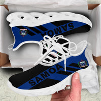 White clunky sneakers with blue SAMOA stripe and white ridged sole in box