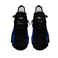 Pair of black clunky sneakers with blue SAMOA graphic and colorful accent logos