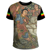 Black graphic T-shirt with colorful biblical manuscript-style illustration on front