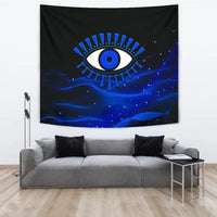 Black tapestry with blue evil eye design over starry night waves