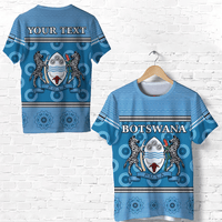 Blue T-shirt back: 'YOUR TEXT' with Botswana flag and crest pattern