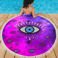 Stranddecke rund: lila-pinkes Evil-Eye-Muster mit blauem Auge und Strahlenkranz