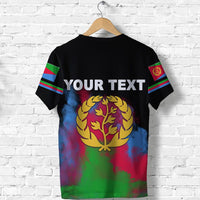 Black T-shirt back with “YOUR TEXT” and gold laurel tree emblem over flag colors.
