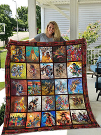 Multicolor Native American quilt, grid of illustrated figures, dark red patterned edging