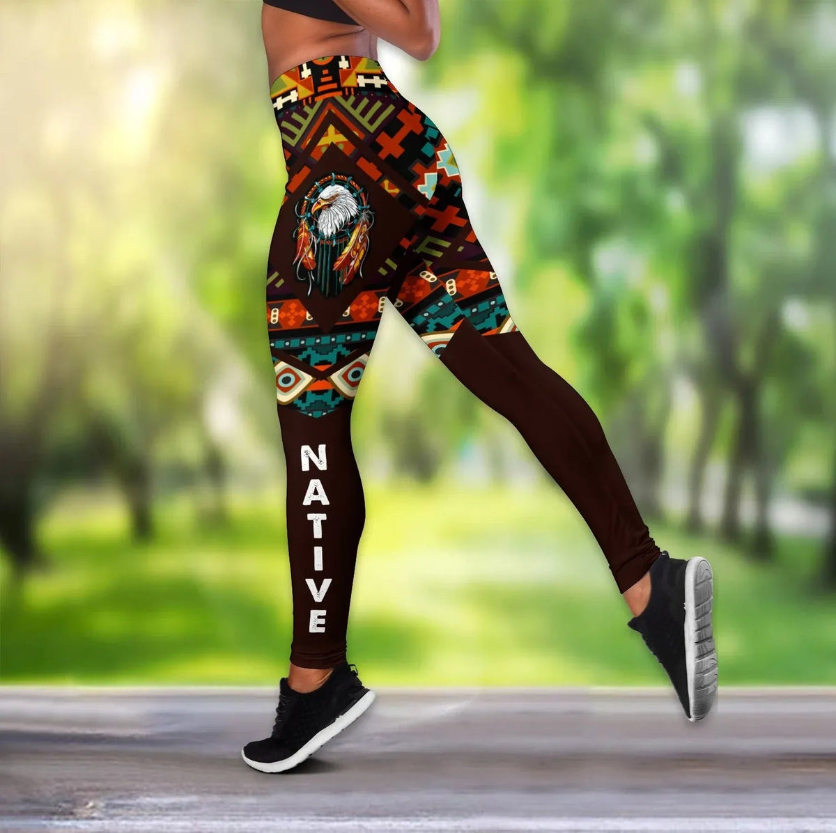 Multicolor leggings with Native eagle dreamcatcher graphic; racerback tank partly visible