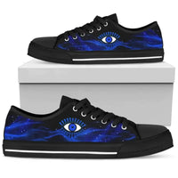 Blue evil eye low top sneakers, black upper with blue galaxy print and white sole stripe.