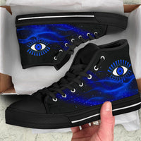Black high-top sneakers with blue evil eye print, shown in box, lace-up with white stripe