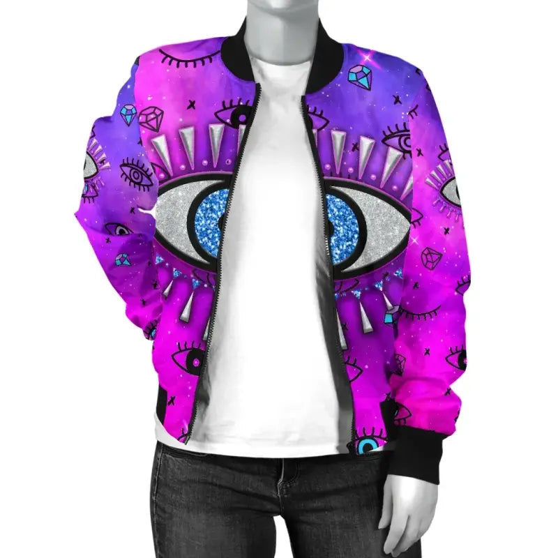 Pink bomber jacket angled over white tee, evil-eye print with star and crystal icons
