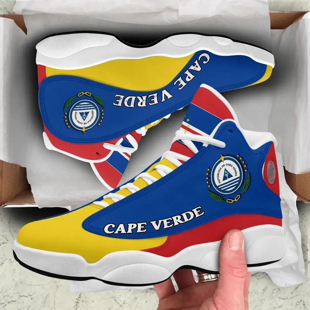 Blue high-top sneakers with Cape Verde crest patch and multicolor side stripe