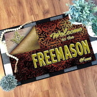 Red door mat with gold 'Welcome to the Freemason' text, ornate pattern, black edging