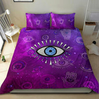 Purple evil-eye bedding set with blue eye center and matching pillows
