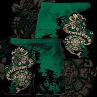 Green shorts with drawstring; Aztec Quetzalcoatl sun stone all-over print