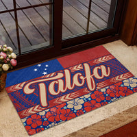 Red and blue 'Talofa' door mat with Polynesian geometric border and floral bottom