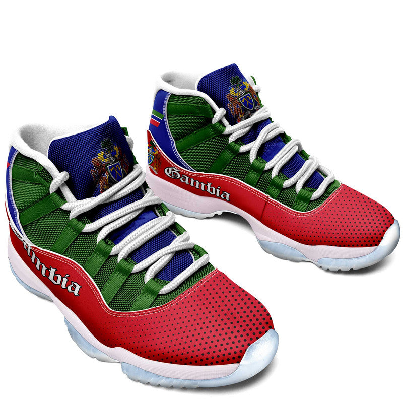 Gambia sneakers front view, red perforated toe, green panels, blue accents, white laces