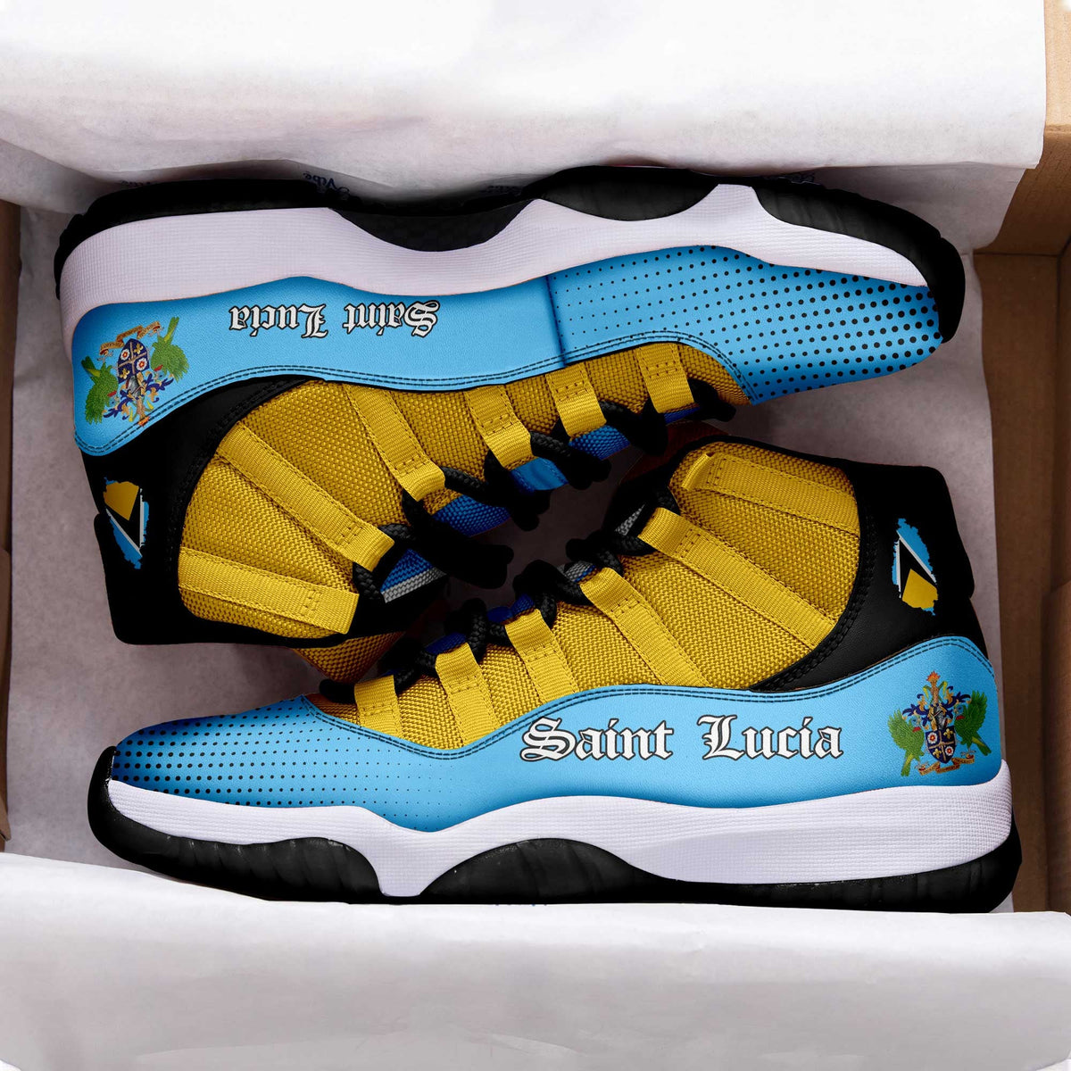 Saint Lucia sneakers in box: yellow uppers, blue tongue, black laces, white sole