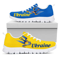 Ukraine sneakers in blue and yellow with white sole; lace-up, 'Ukraine' logo on side