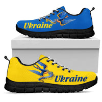 Ukraine sneakers, blue and yellow uppers with black sole; lace-up with 'Ukraine' text