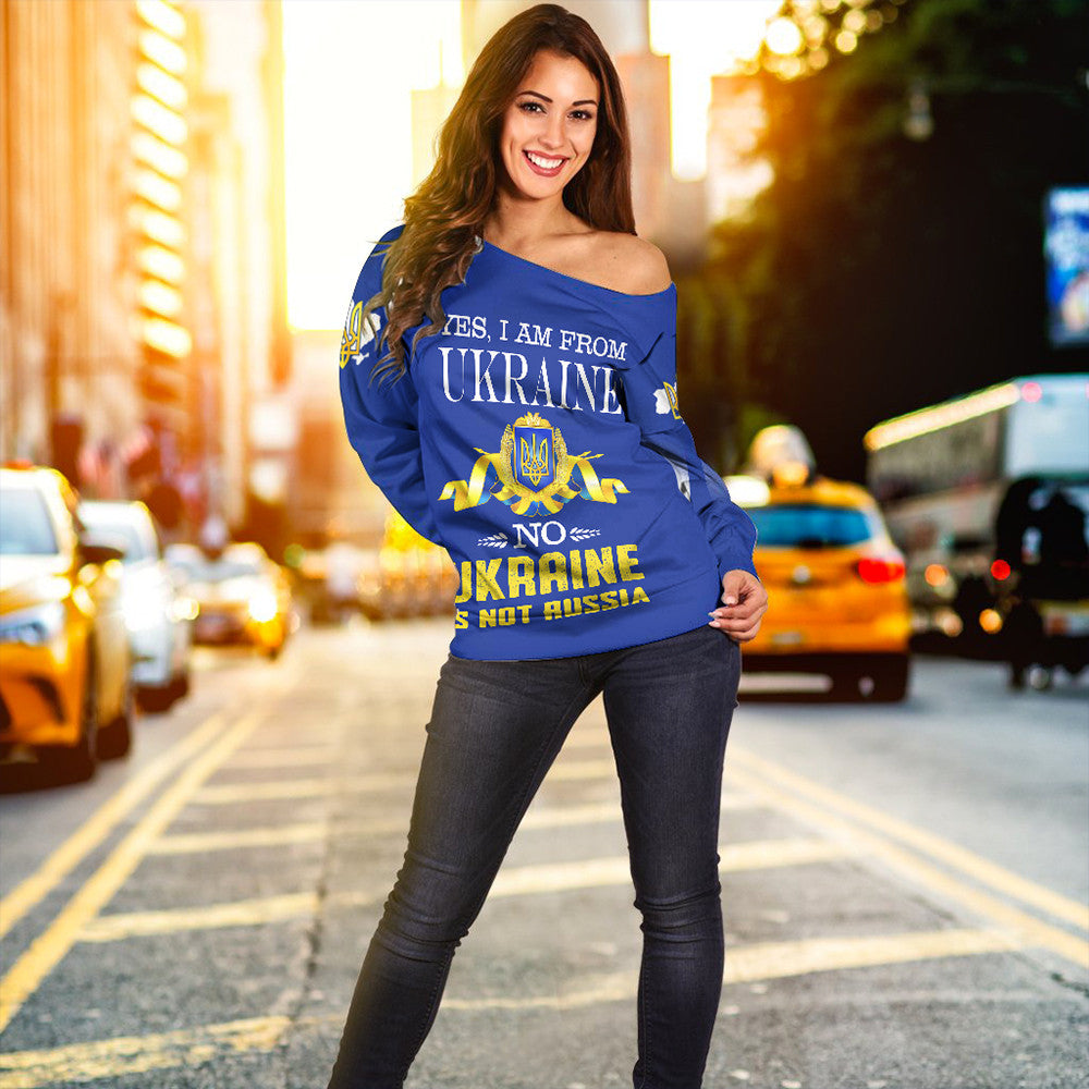 Blue off-shoulder sweatshirt with “Yes, I am from Ukraine” text and gold trident