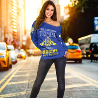 Blue off-shoulder sweatshirt with “Yes, I am from Ukraine” text and gold trident