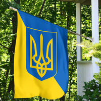 Ukrainian house or garden flag in blue and yellow with Tryzub trident coat of arms