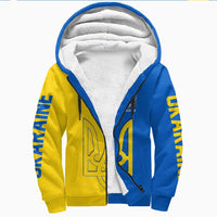 Blue and yellow zip-up hoodie with sherpa hood lining and front crest graphic