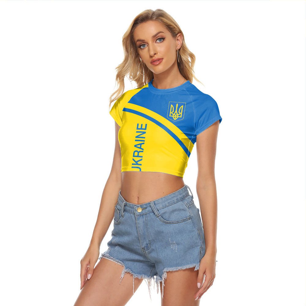 Women’s cropped raglan tee in blue with yellow panel and Ukraine crest front print