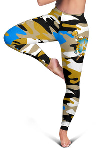Camo leggings close-up: gold crest with sword; blue blotches on black and tan