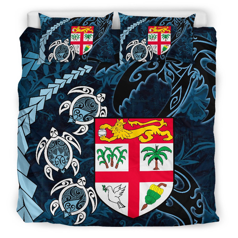 Blue duvet cover set with crest shield, turtle, palm trees and island motifs; includes 2 pillows
