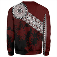 Red unisex crewneck sweatshirt back with large circular emblem and diagonal pattern band